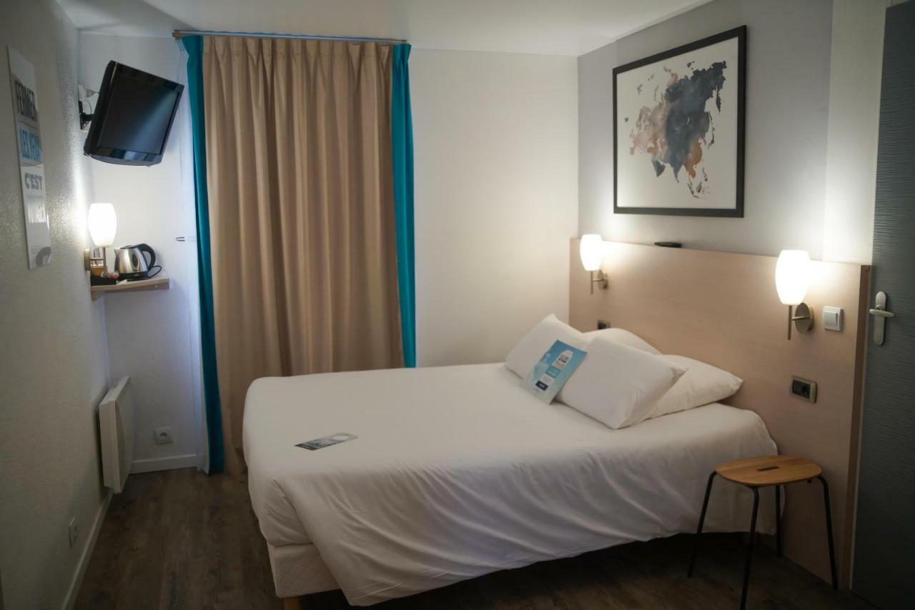 Kyriad Hotel La Fleche Bagian luar foto